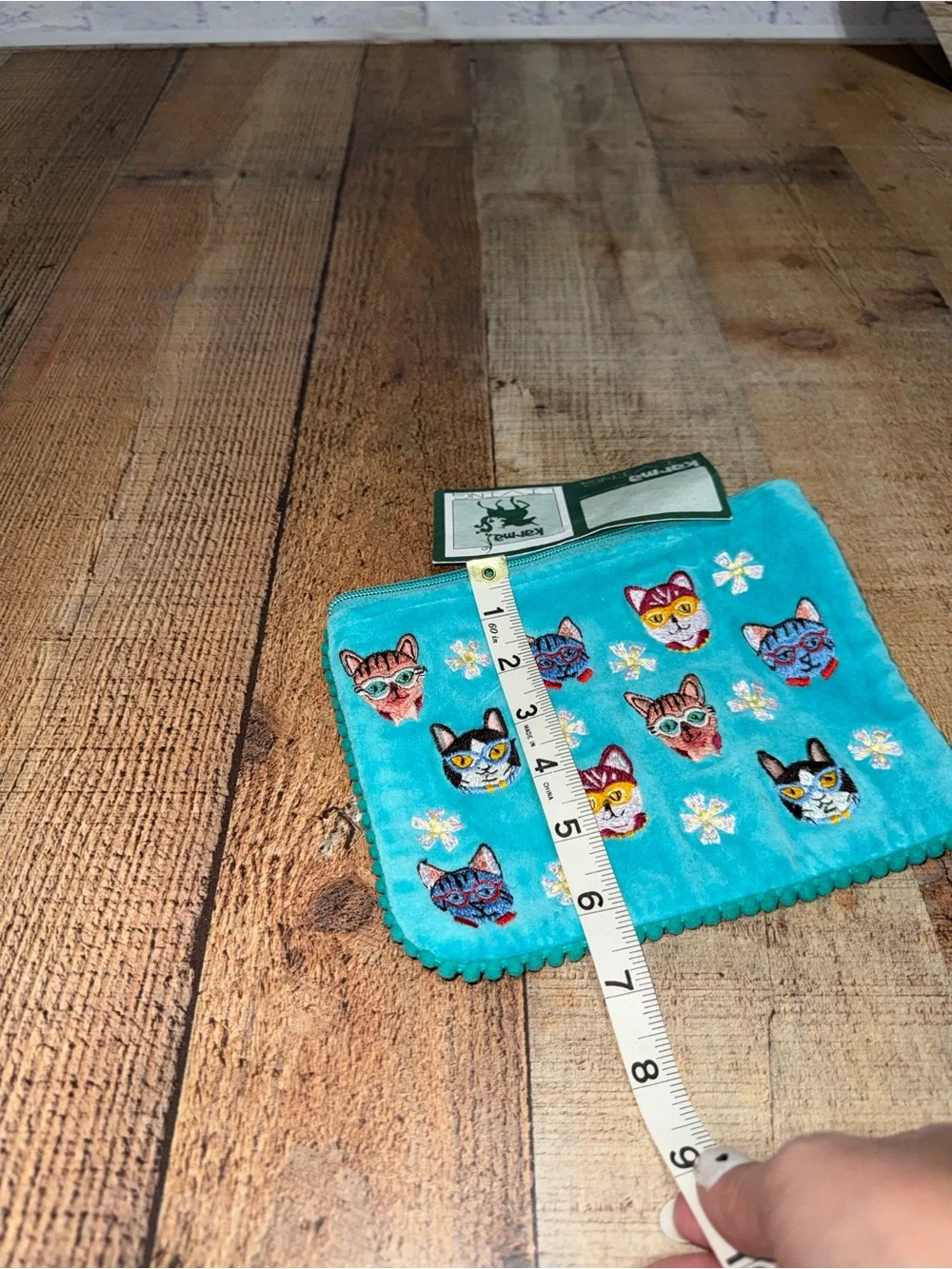 Karma living cat face Pom Pom pouch new with flaws